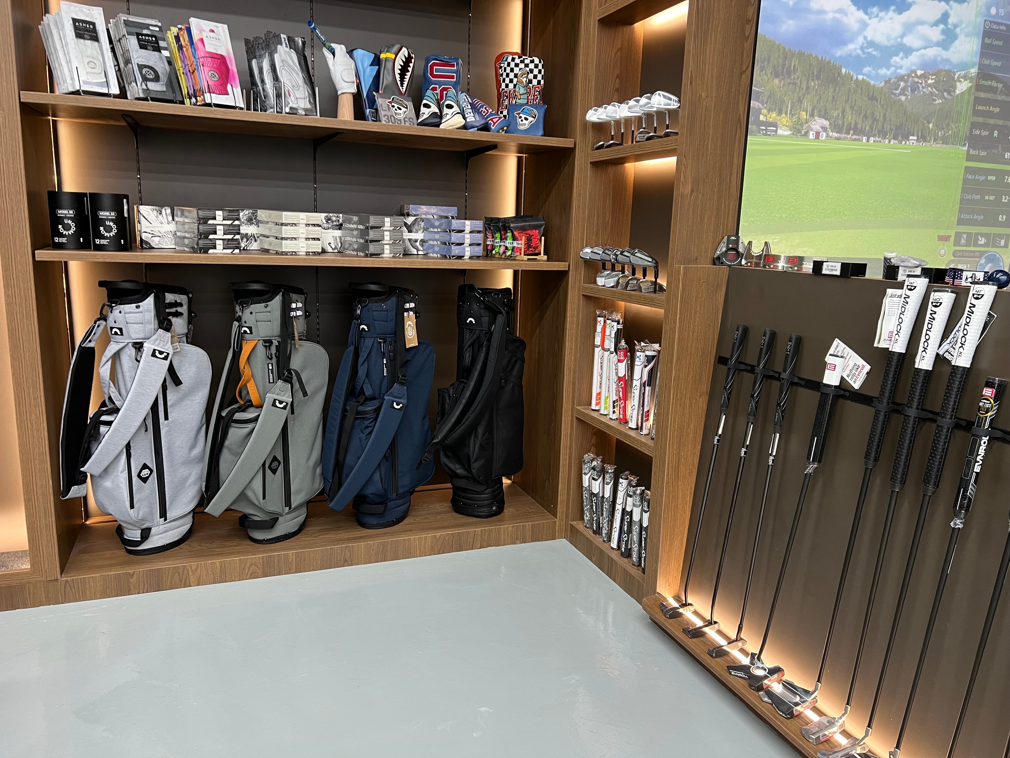 Image of a golf pro shop offering a wide range of high-quality equipment and accessories, such as golf clubs, putters, grips, golf bags, golf balls, gloves, and more.