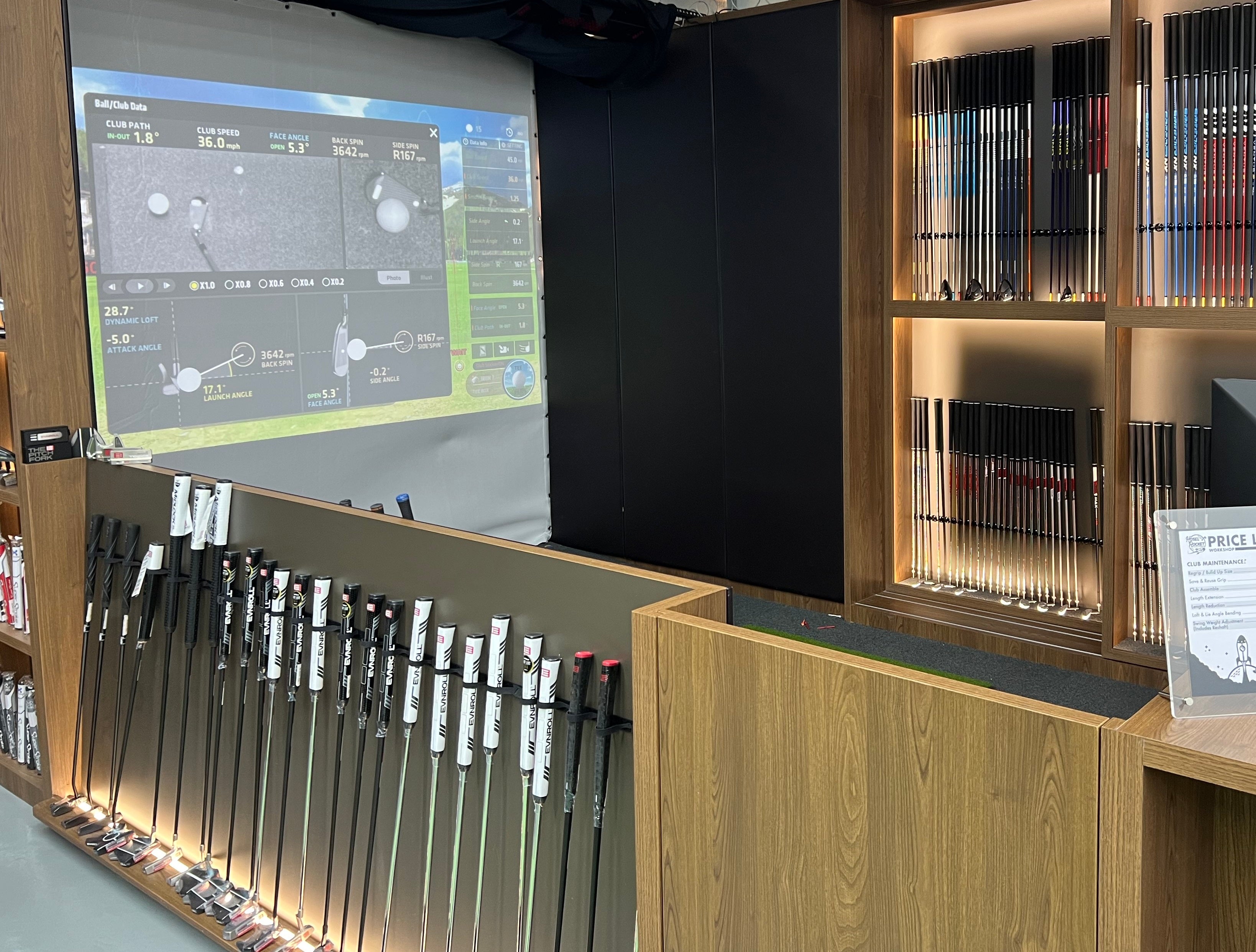 Image of a large collection of golf clubs and shafts in a club fitting bay.